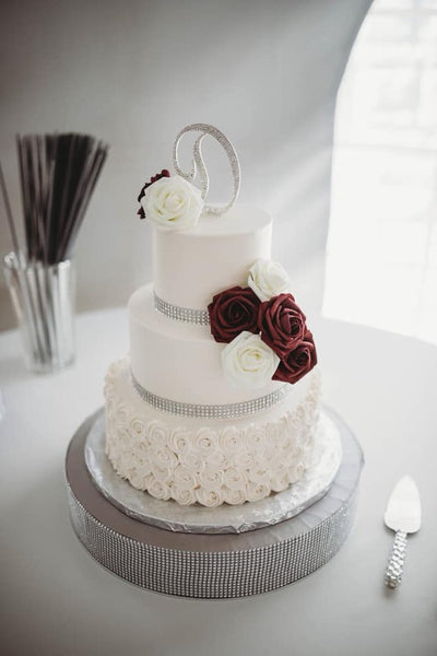Customer Question:  Do you offer wedding cakes?